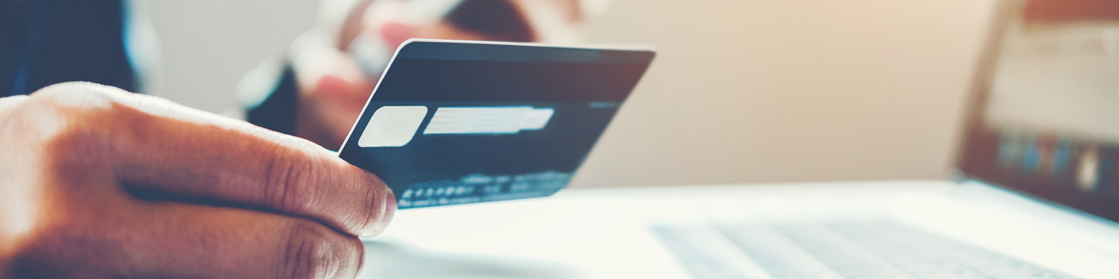 Hand holding credit card