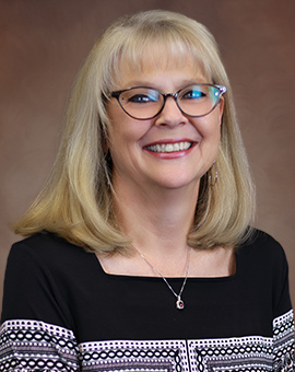 Portrait of Bev Paron, Retail Manager/Executive Admin of Roseville