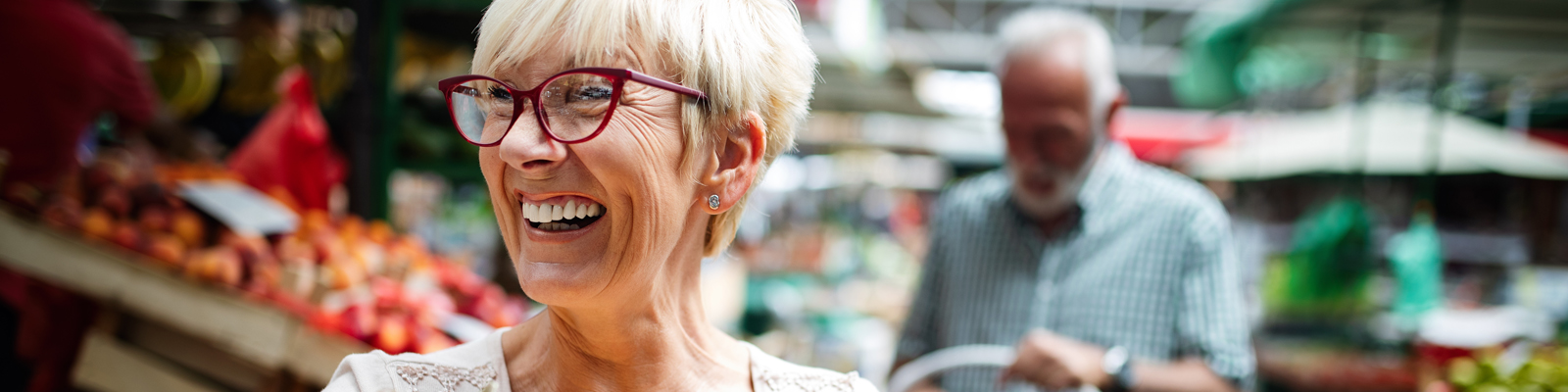 Woman smiling at farmer's market