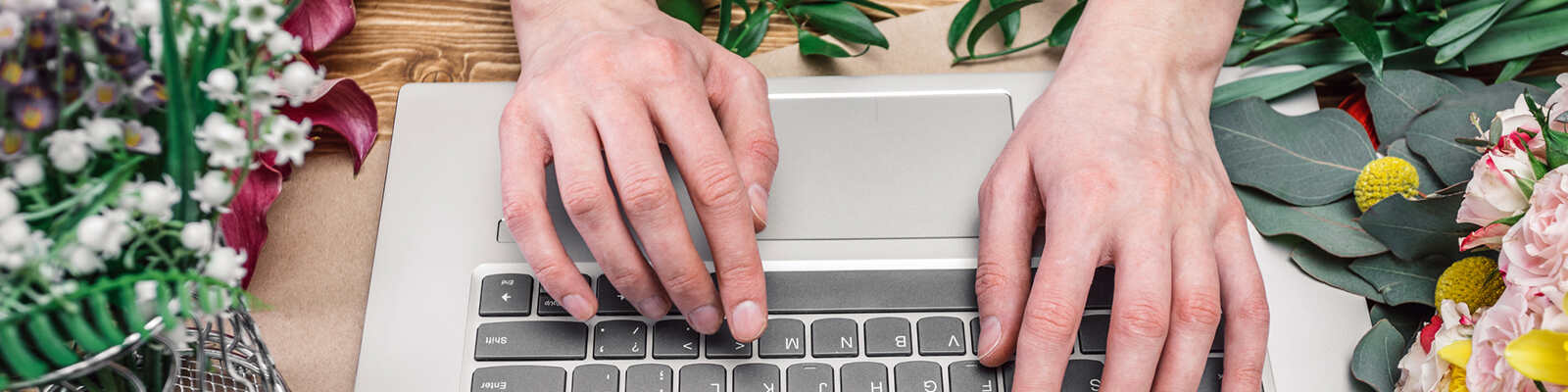 Business owner working on laptop
